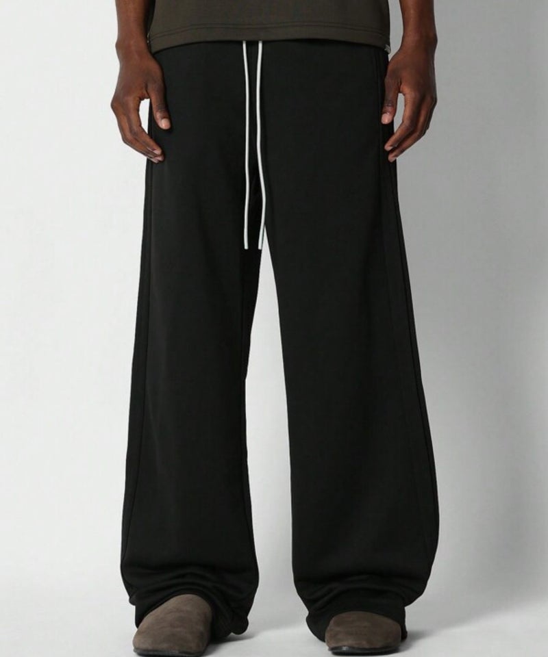 فلاينوف بنطال رجالي أسود سادة فضفاض مناسب للارتداء اليومي، بتصميم مريح - Image 1